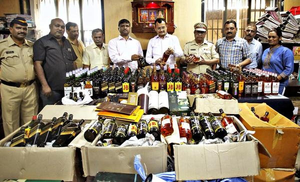 Three arrested after liquor bottles found at pharma firm